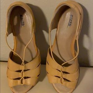 Pair of yellow sandals by Earth Origin